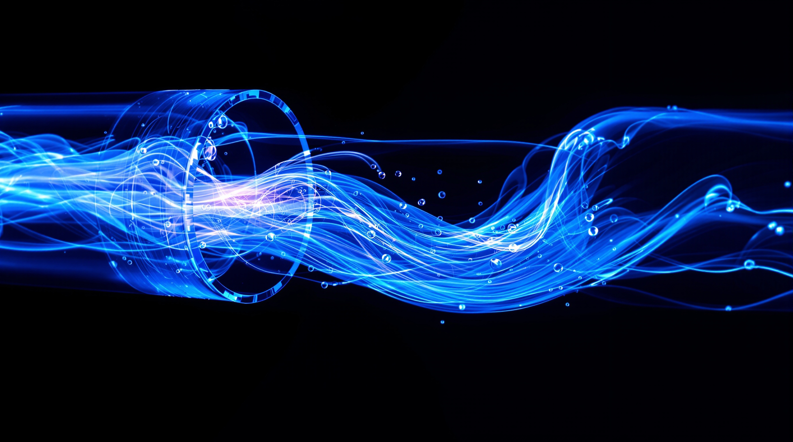 Flow visualization showing turbulent streamlines through a transparent pipe section